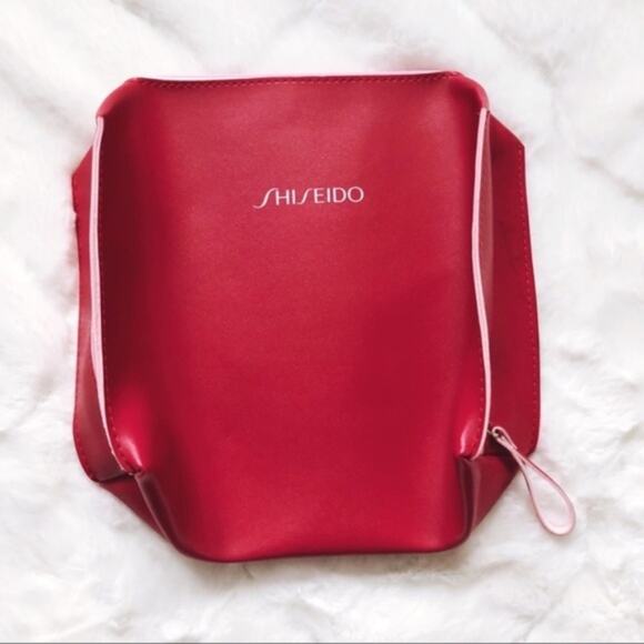 Shiseido Handbags - Shiseido Fuchsia Makeup Bag
